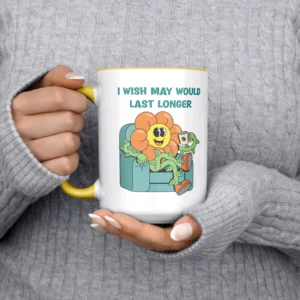 Woman Holding Funny Teacher Mug That Says I Wish May Would Last Longer